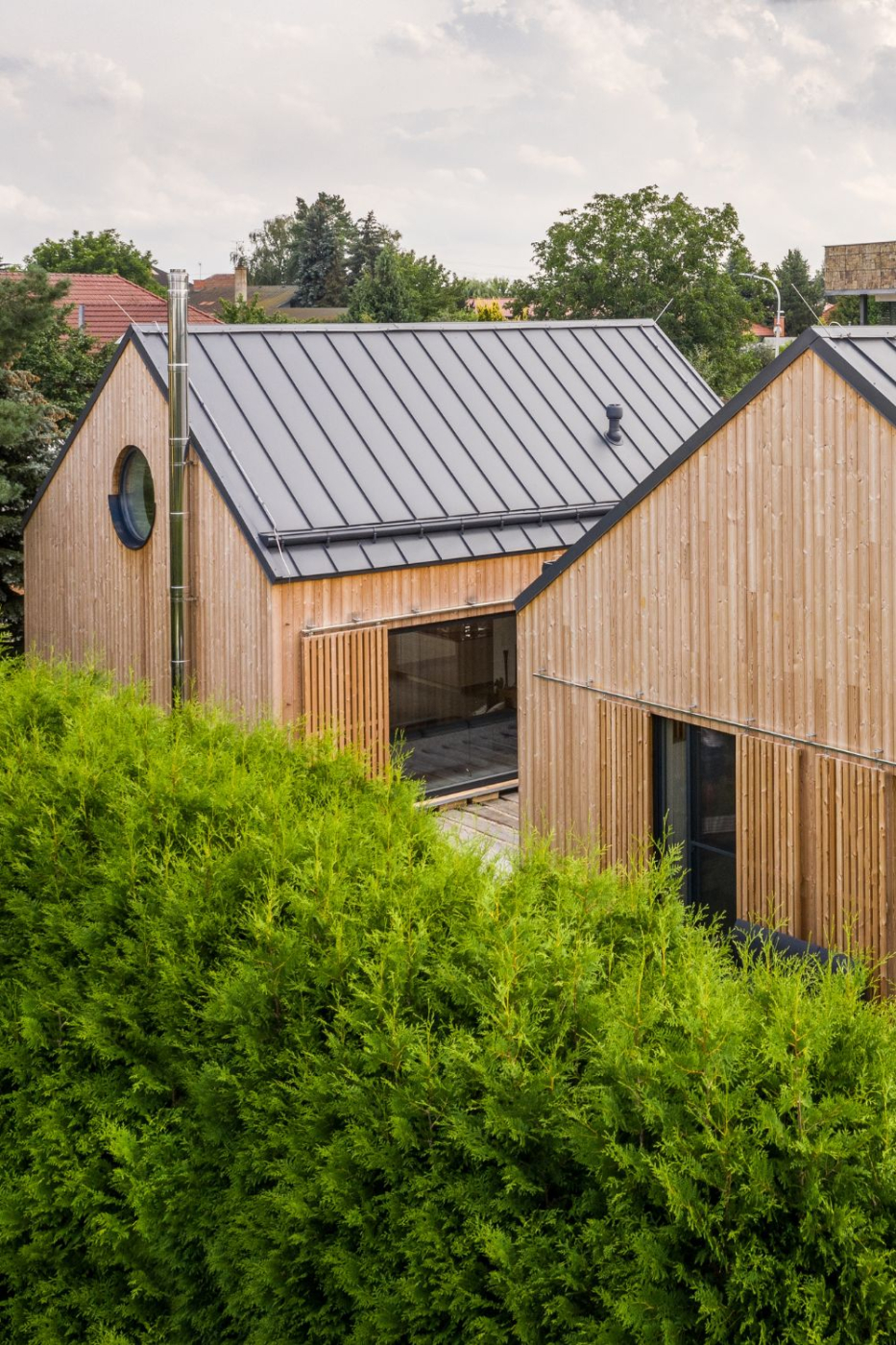 Modern UK house with horizontal timber cladding installed as ventilated rainscreen system