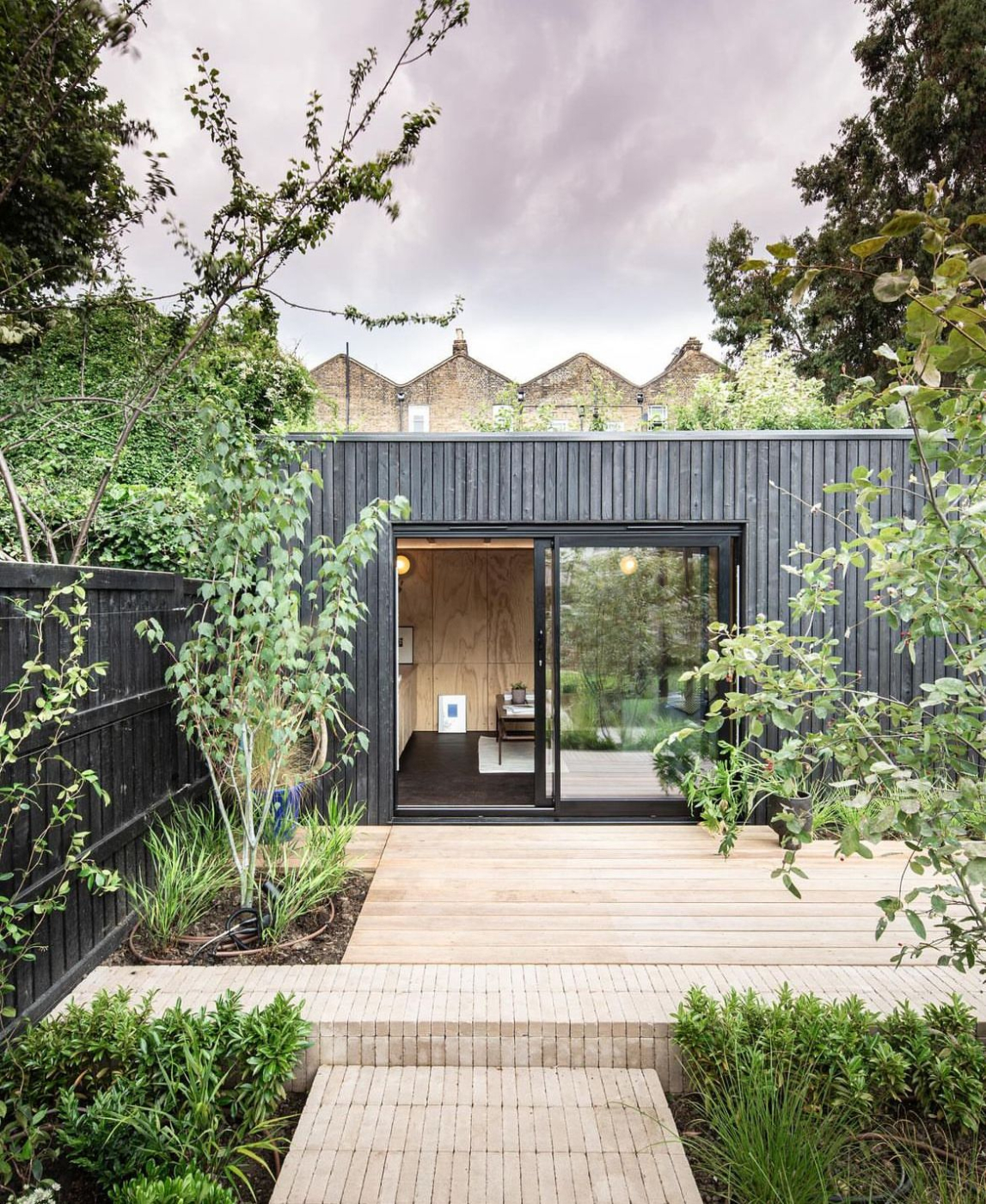 Black timber cladding on UK garden room exterior — contemporary garden office design