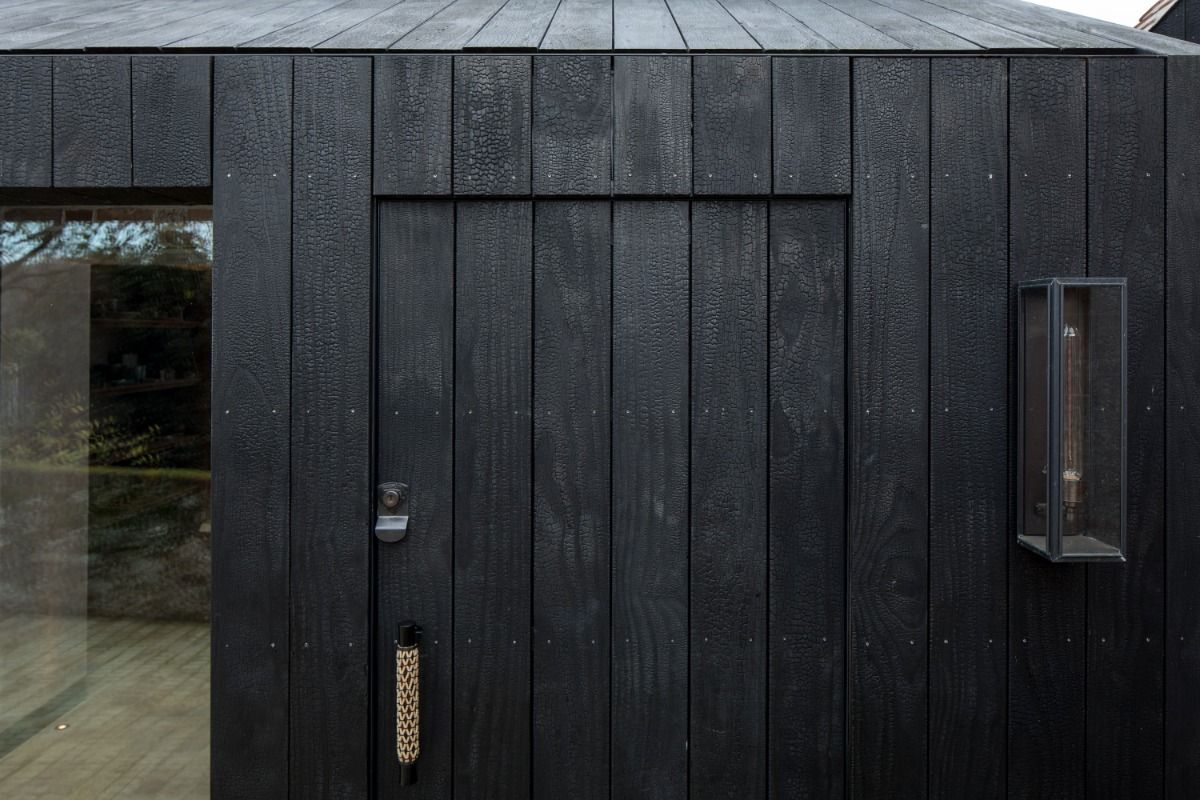 Contemporary house with black charred timber exterior cladding