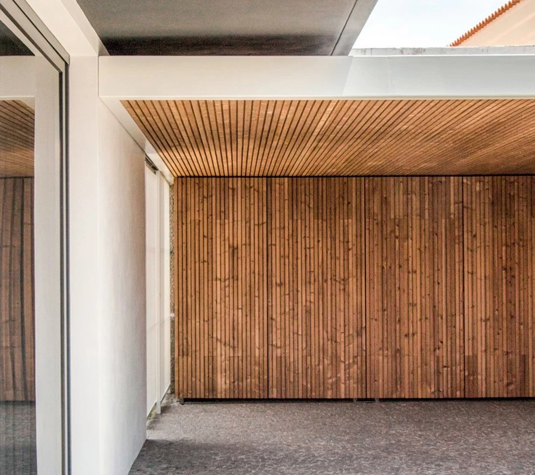 Lunawood triple shadow gap installed vertically creating batten look effect on contemporary building