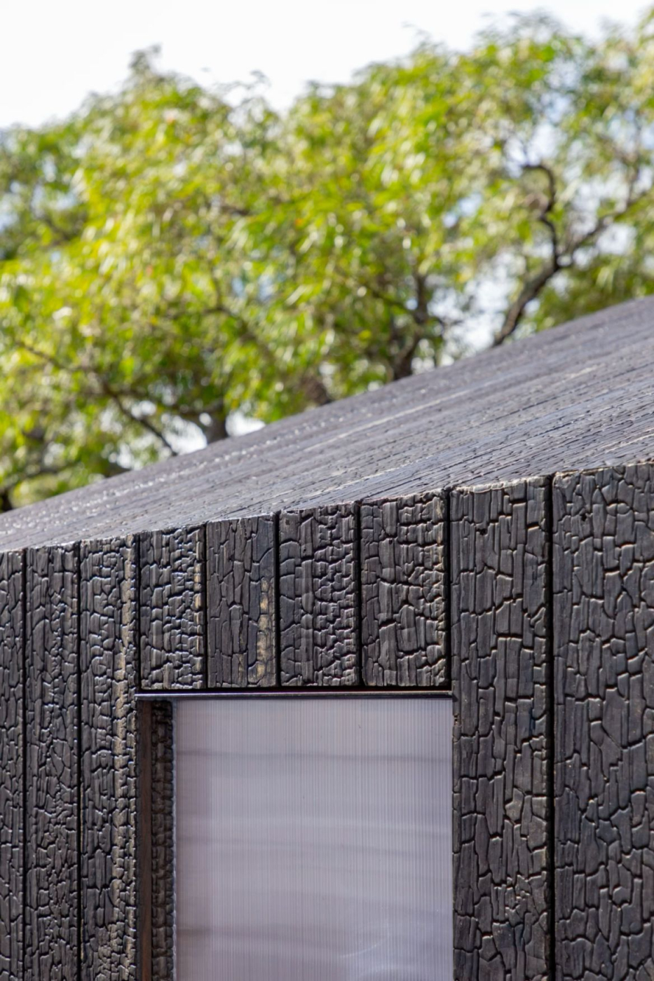Deep charred timber cladding on garden sauna exterior — contemporary UK outdoor sauna build