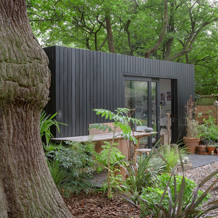 Black timber cladding on UK garden office exterior — deep charred finish contemporary build