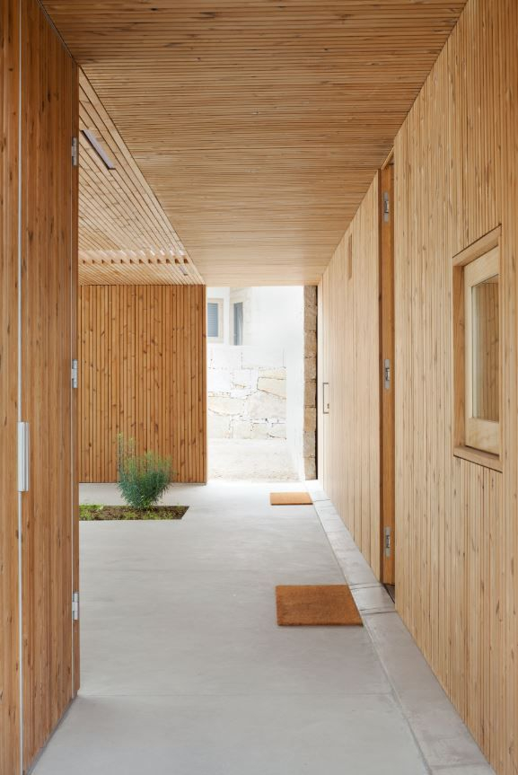 Lunawood ThermoWood vertical cladding on UK building — thermally modified timber contemporary facade