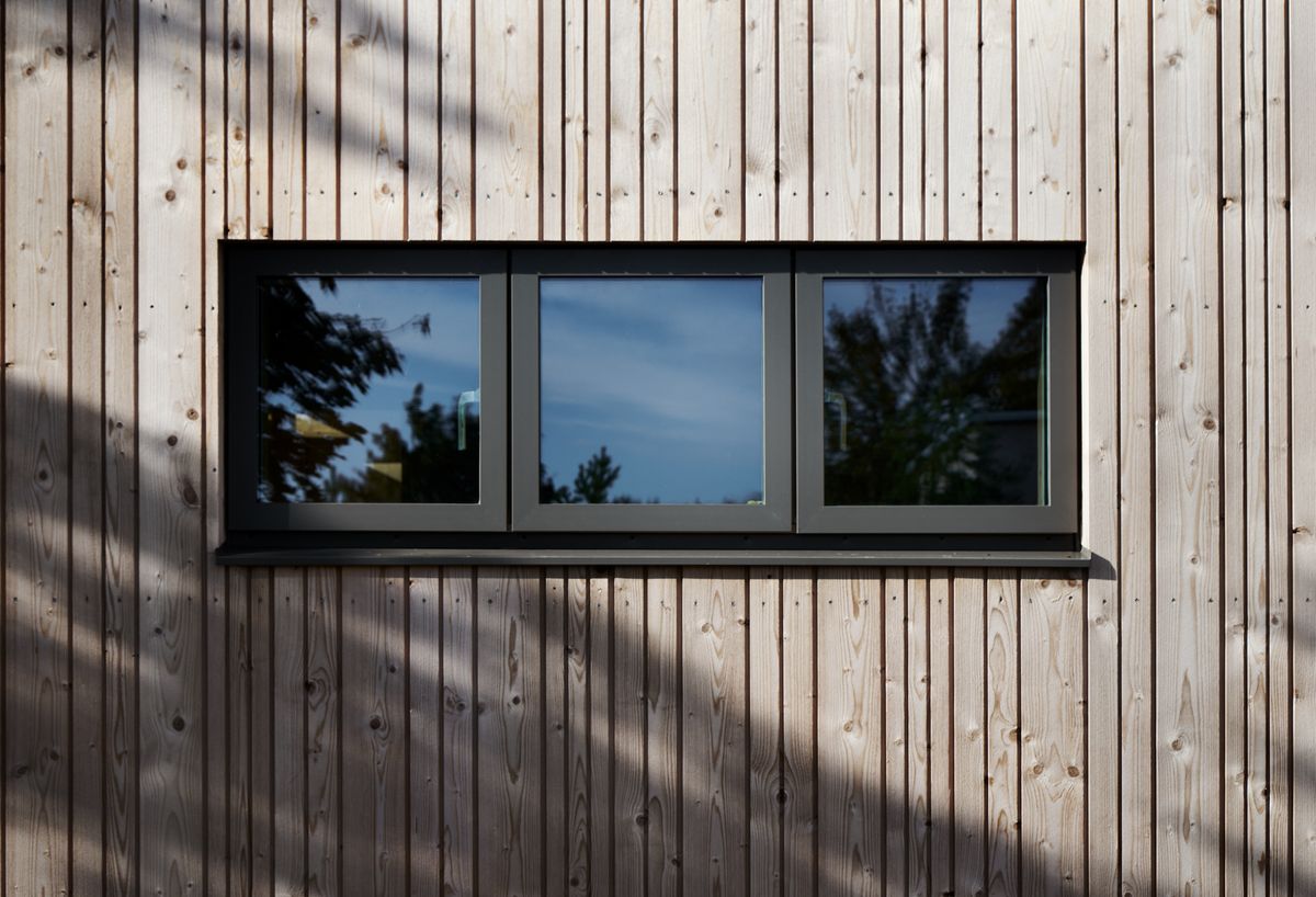 Vertical timber cladding on a modern residential house design