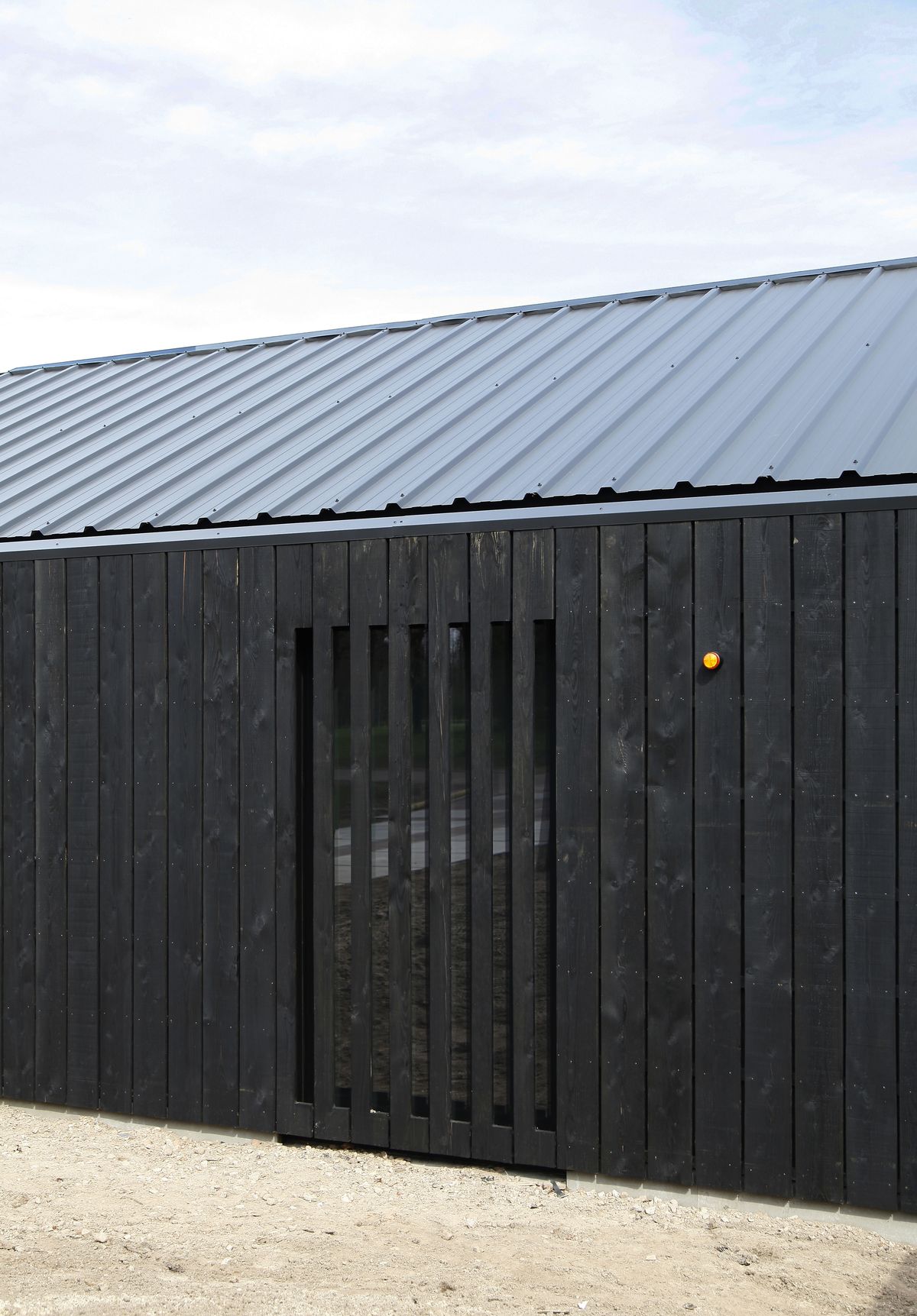 Painted timber cladding boards on residential house exterior