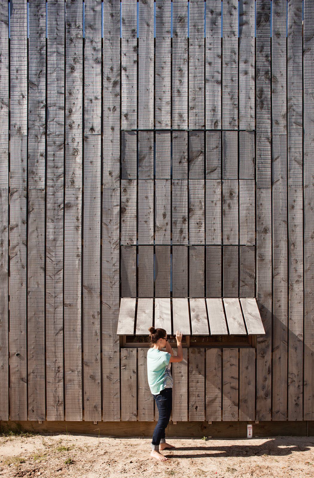 Painted timber cladding boards on residential house exterior