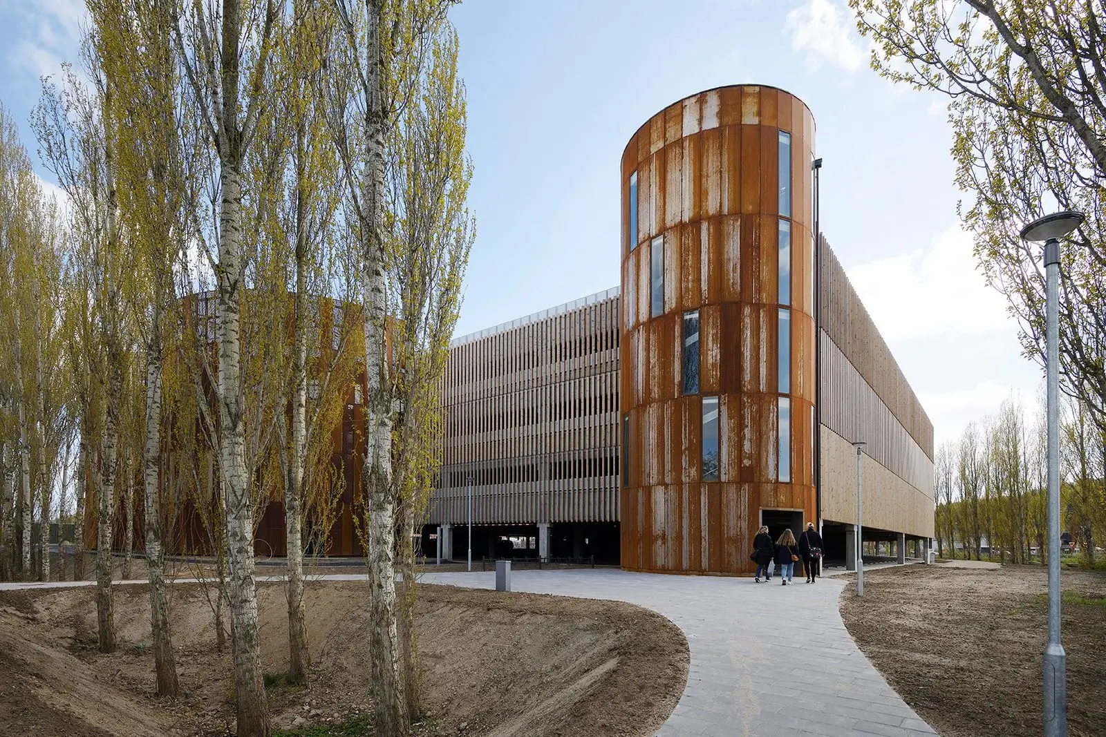 Timber cladding window reveal detail showing ventilation gap and flashing UK construction