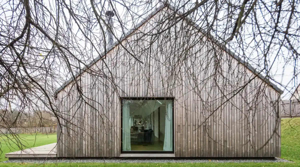 Weathered vs newly installed ThermoWood cladding UK — comparison of new honey-brown and weathered silver-grey