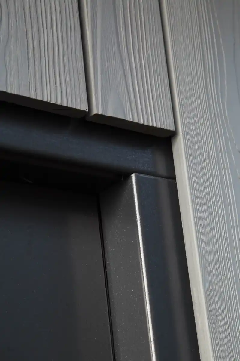 Composite cladding close-up — embossed grain pattern and manufactured surface texture WPC boards