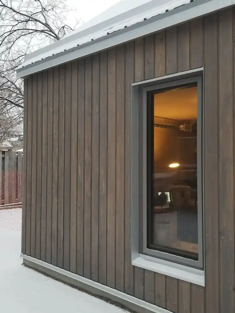 Composite cladding on UK garden room — wood plastic composite exterior finish