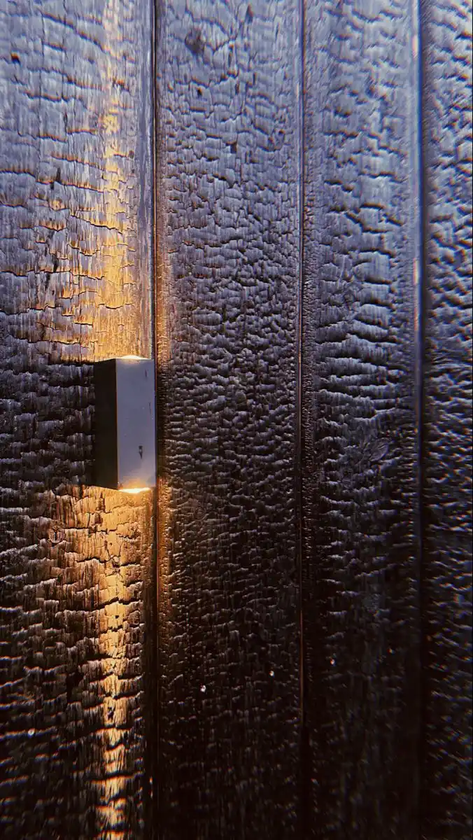 Deep charred tongue and groove cladding UK — Shou Sugi Ban larch T&G profile exterior facade