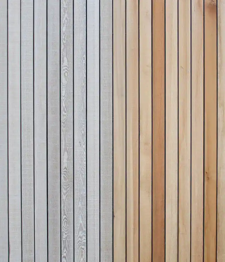 Douglas fir cladding weathered vs treated — comparison showing natural silver-grey weathering against maintained reddish-brown finish