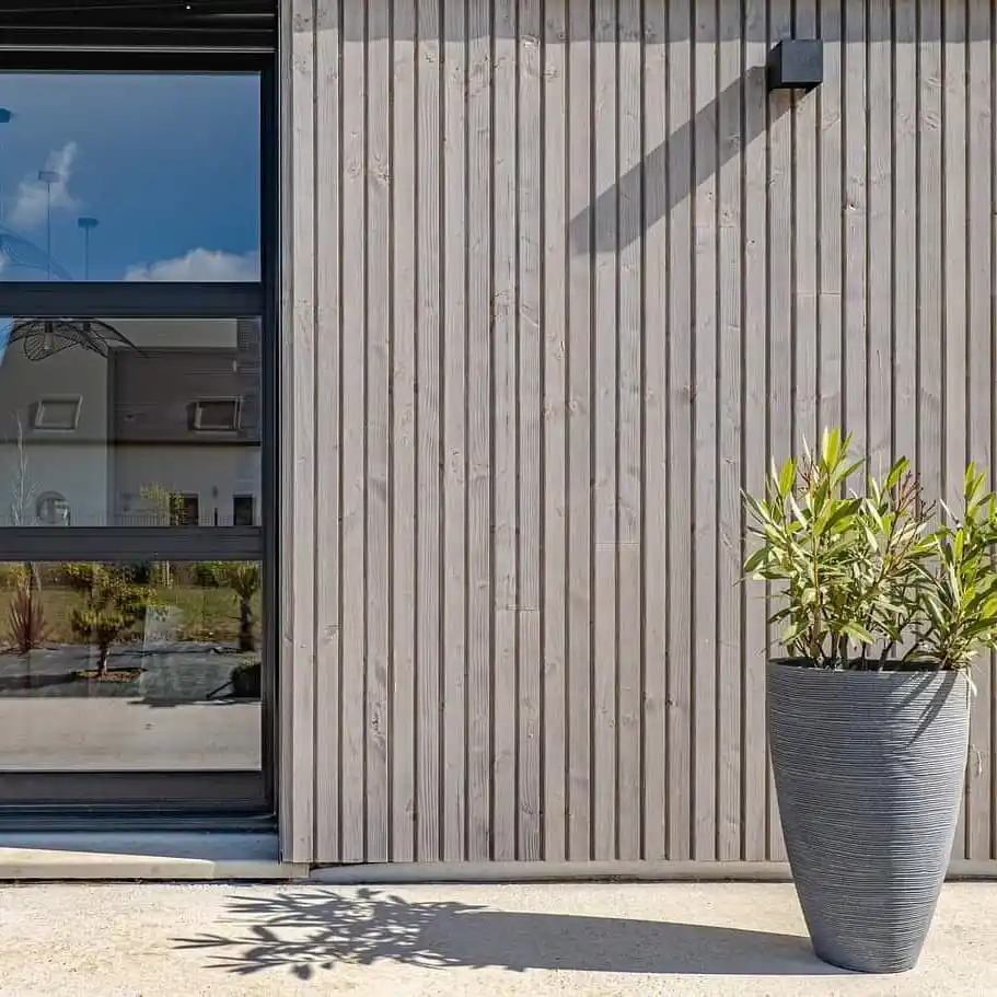 Douglas Fir cladding pre-weathered UK — natural silver-grey patina on exterior Douglas Fir boards