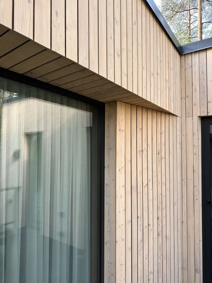 Douglas Fir treated cladding UK — oiled finish maintaining warm reddish-brown colour