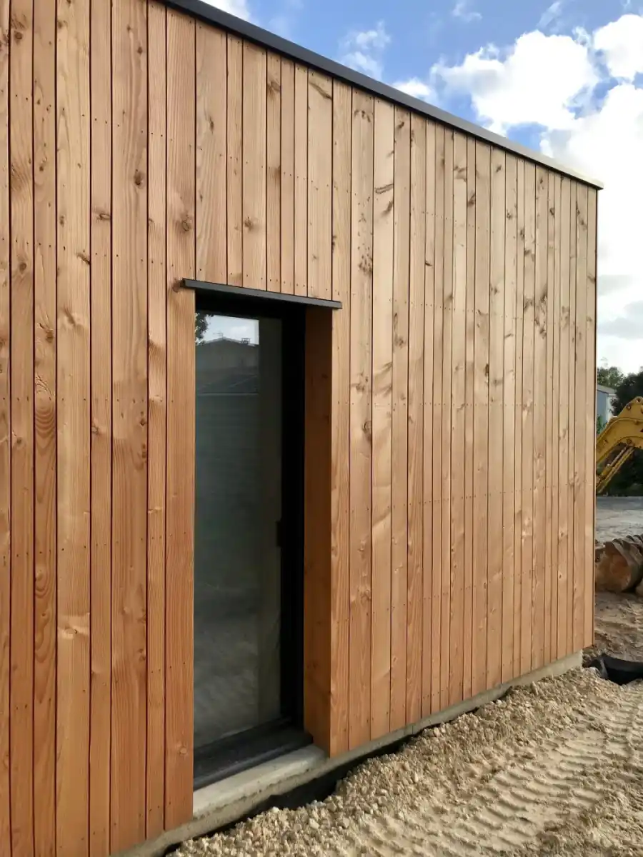 Douglas Fir vertical cladding UK — contemporary installation on modern building exterior