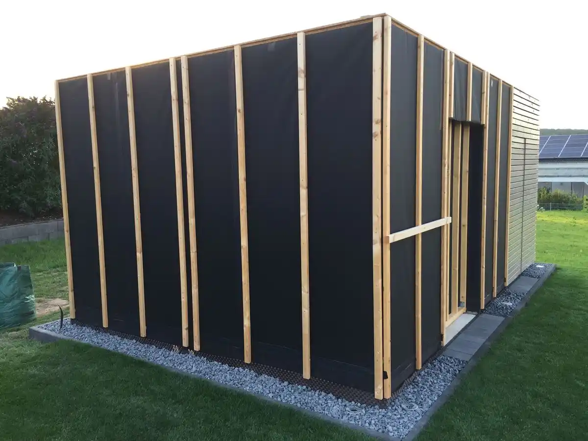 Garden room ready for timber cladding UK — breather membrane fixed over timber frame