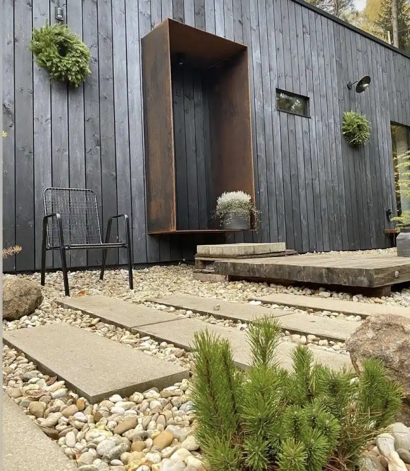 Charred timber cladding on UK garden office — fully installed contemporary exterior