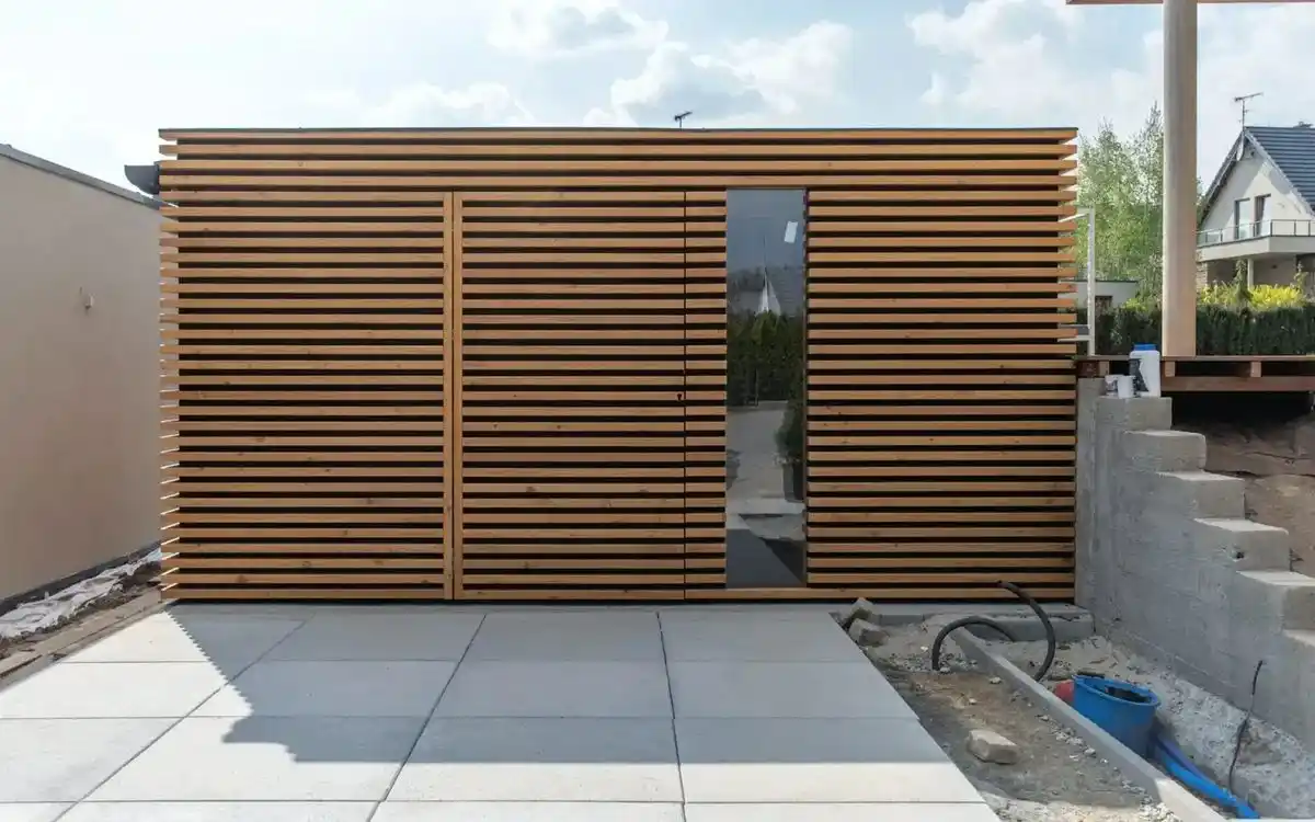 Garden room cladding completed UK — finished timber clad exterior of contemporary garden room