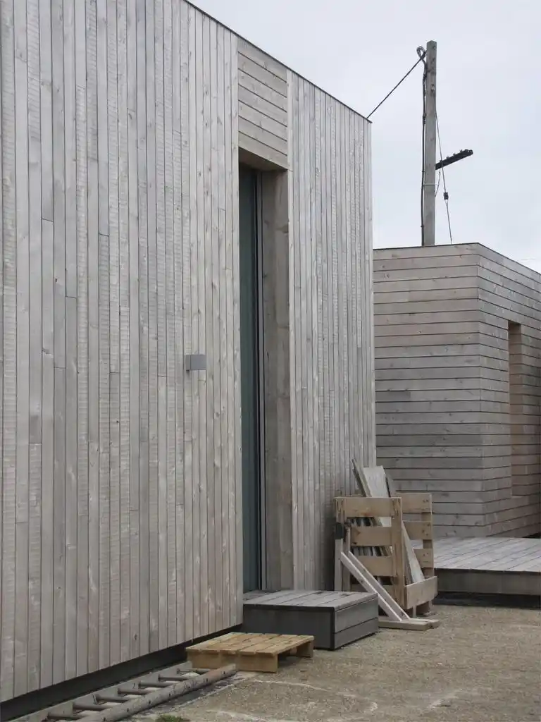 Lunawood triple shadow gap ThermoWood cladding fully weathered — natural silver-grey patina UK exterior