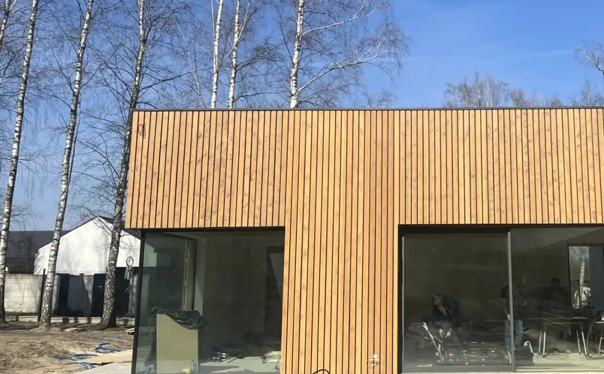 Nordic spruce external cladding elevation on UK residential building — contemporary facade