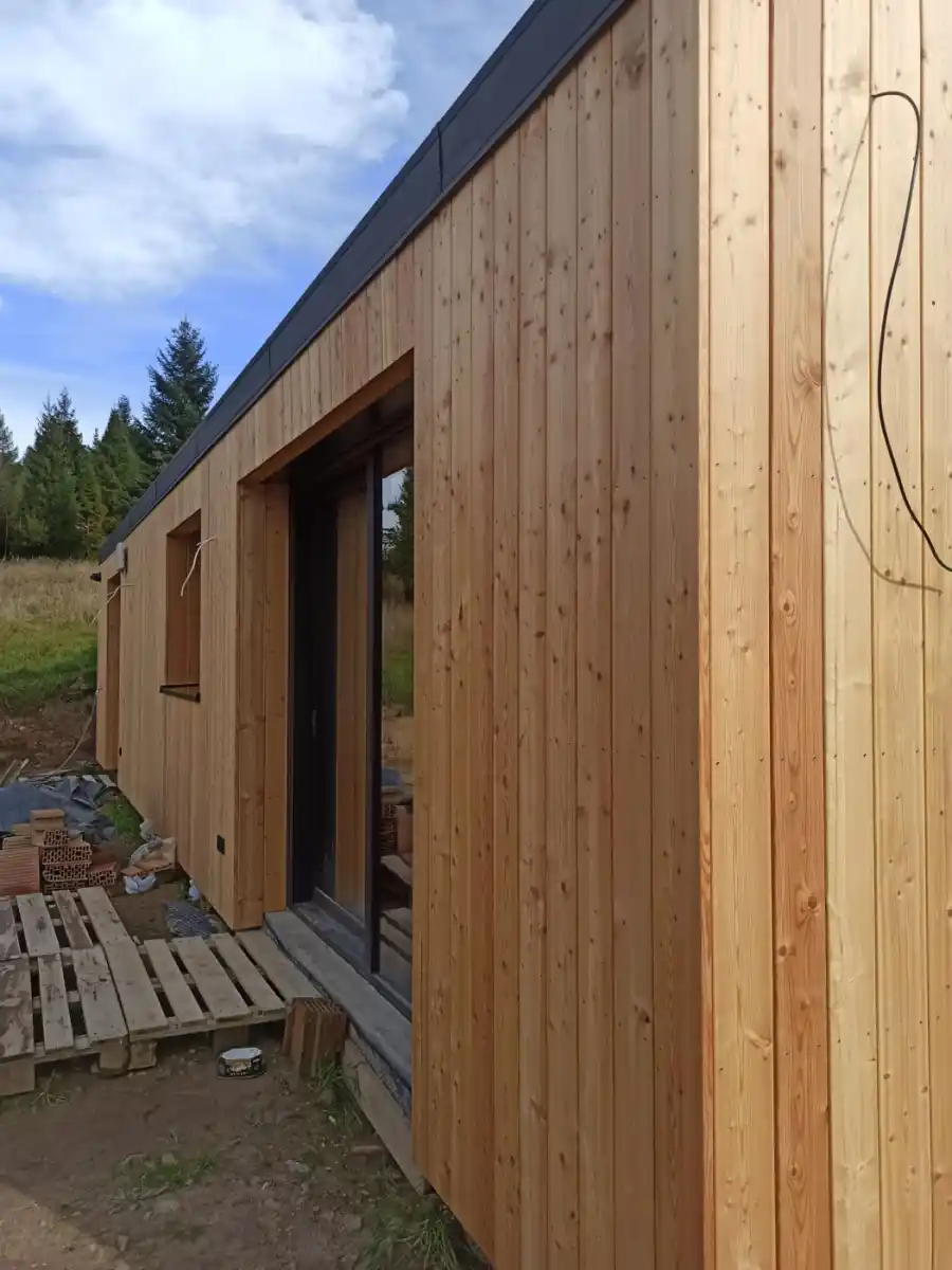 Siberian larch tongue and groove cladding UK installed — naturally durable larch T&G exterior