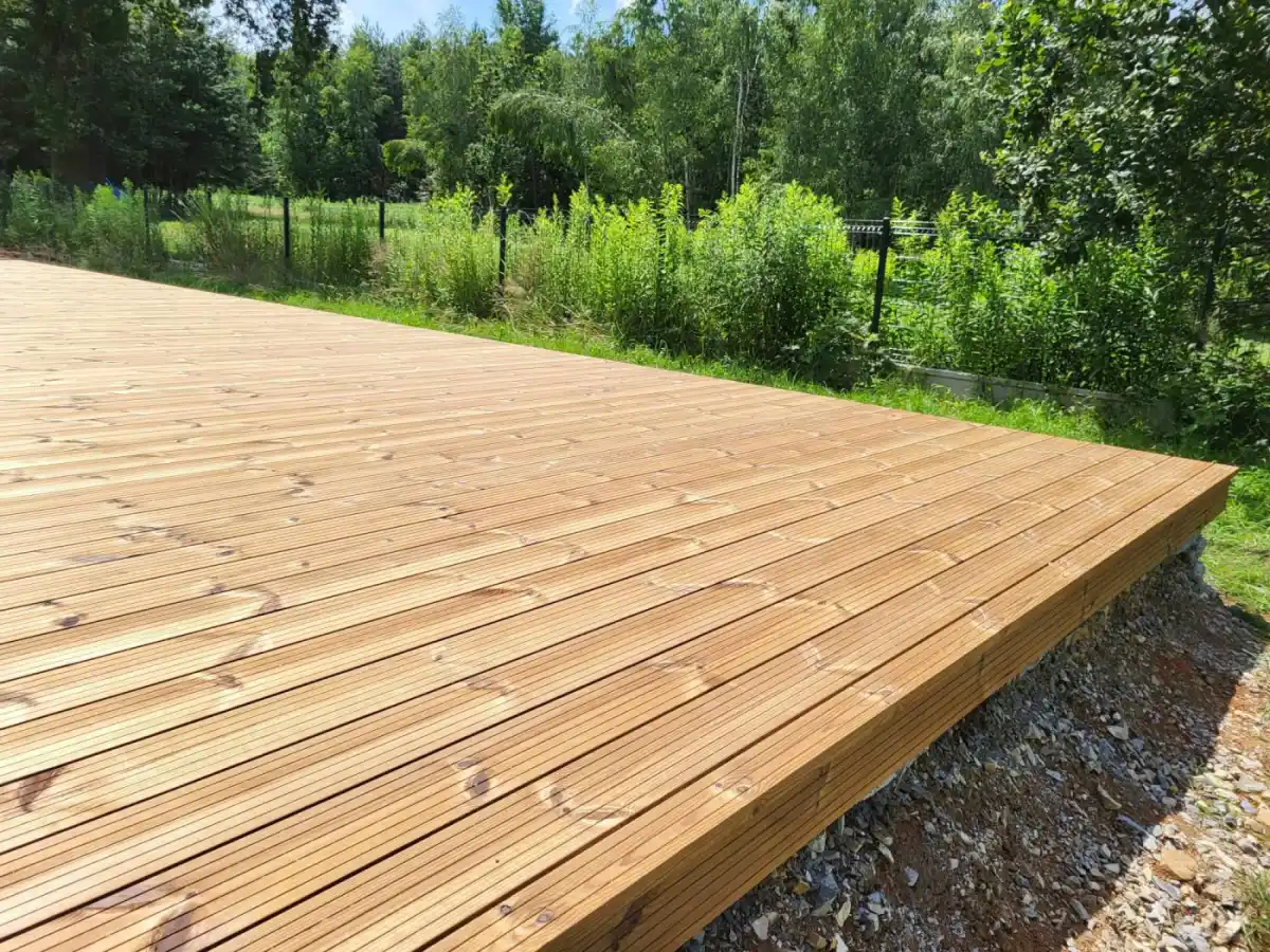 ThermoWood grooved secret fix decking boards UK — contemporary hidden fastener deck design
