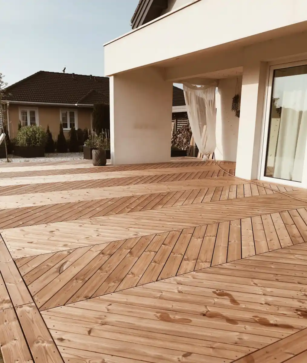 ThermoWood decking installed UK — thermally modified pine deck boards outdoor garden
