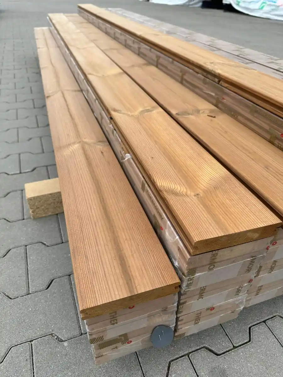 ThermoWood decking boards on pallet UK — thermally modified pine deck boards ready for delivery