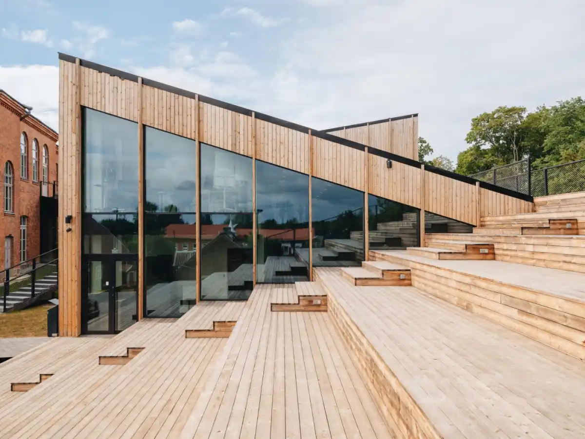 Timber cladding healthcare UK — ThermoWood pine timber on contemporary building exterior