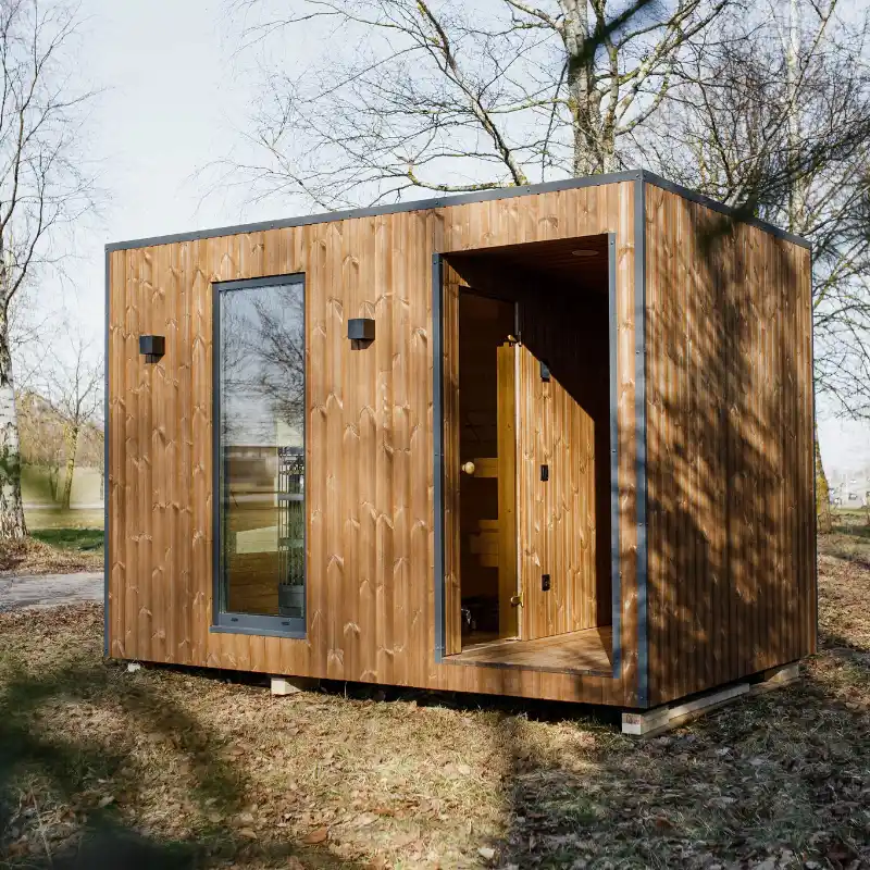 ThermoWood sauna external cladding UK — thermally modified timber on garden sauna exterior
