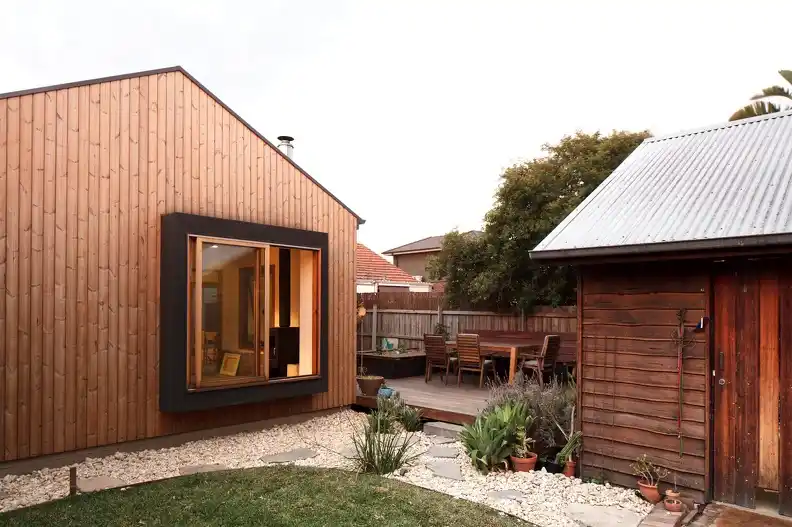 ThermoWood tongue and groove cladding UK installed — thermally modified pine T&G exterior wall