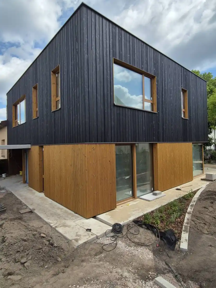 Timber rainscreen cladding commercial UK — timber cladding on commercial building exterior