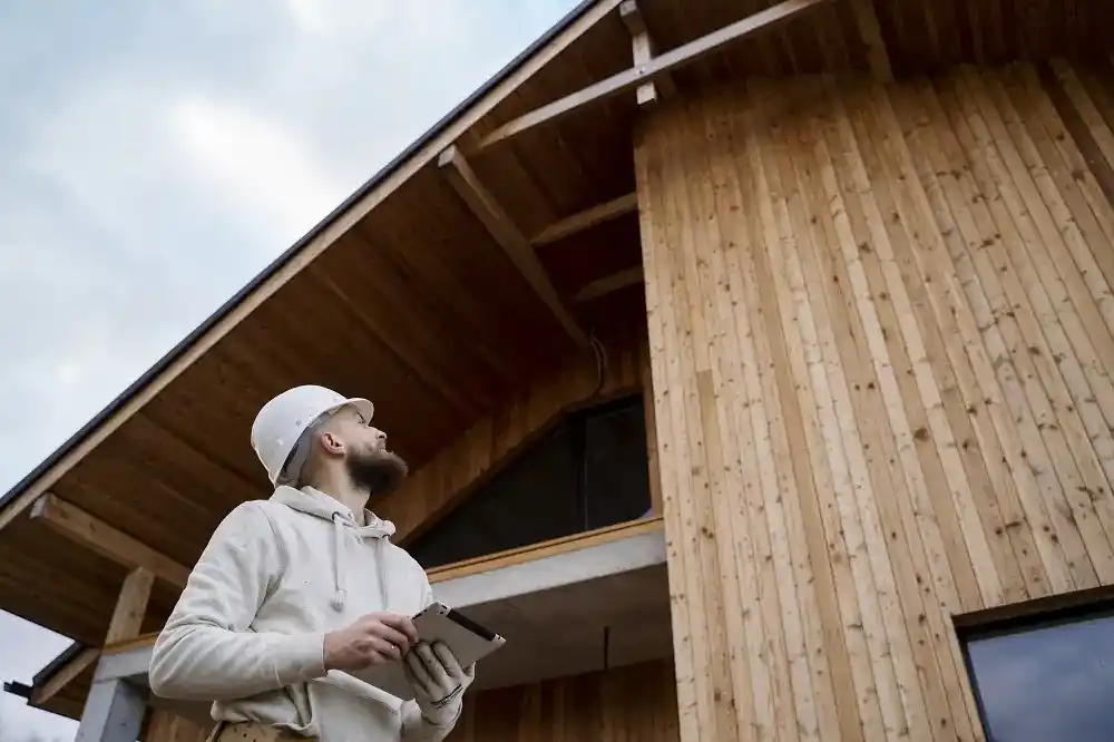 Timber cladding new build UK — contemporary timber clad residential building exterior