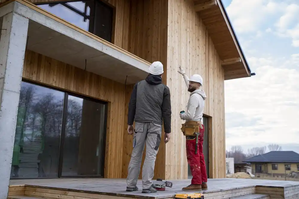 Timber cladding on residential building UK — natural timber facade on apartment block