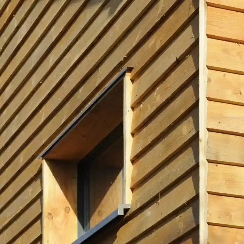 Feather edge sawn cladding UK — rough sawn timber featheredge boards texture detail