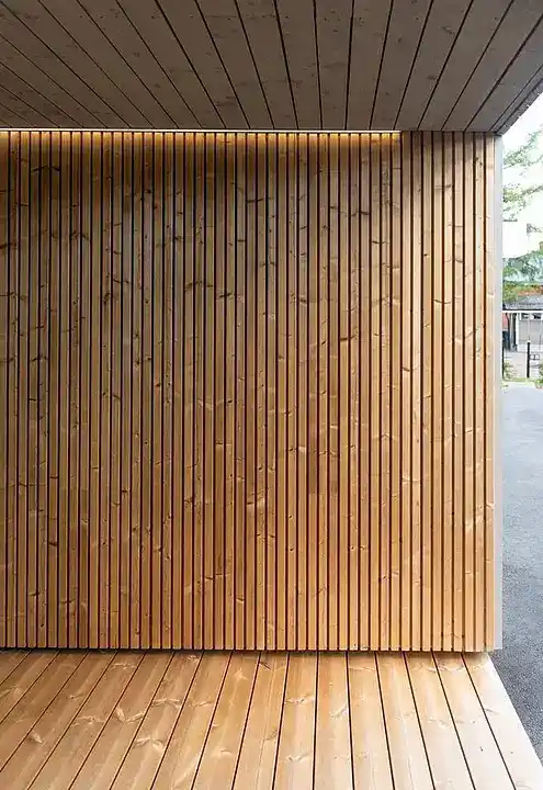 Lunawood triple shadow gap cladding close-up — three recessed shadow grooves on ThermoWood pine board