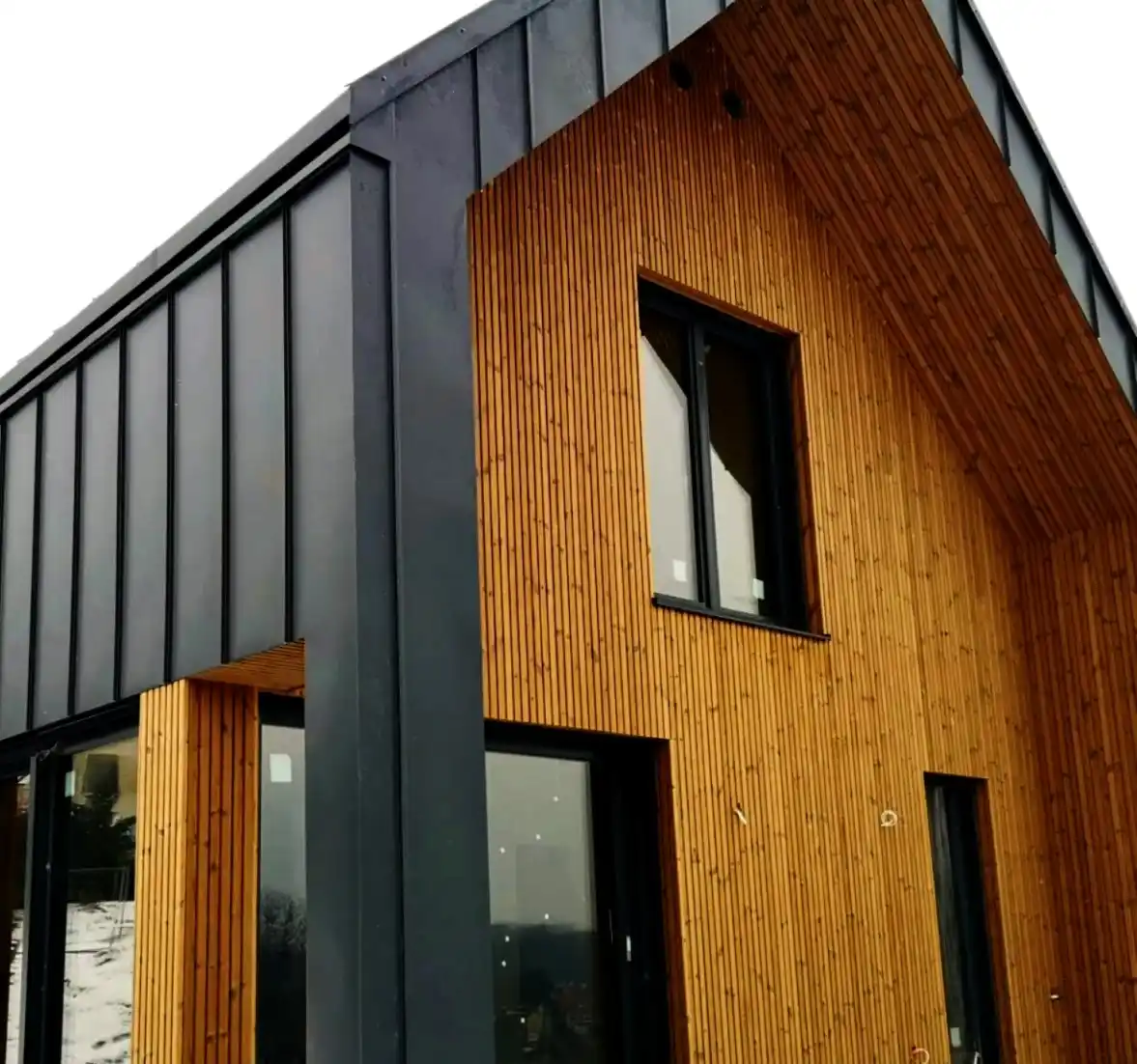 ThermoWood double shadow gap cladding UK — thermally modified timber exterior facade