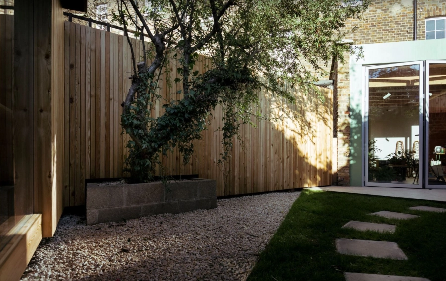 horizontal shadow gap timber cladding profile on contemporary house extension