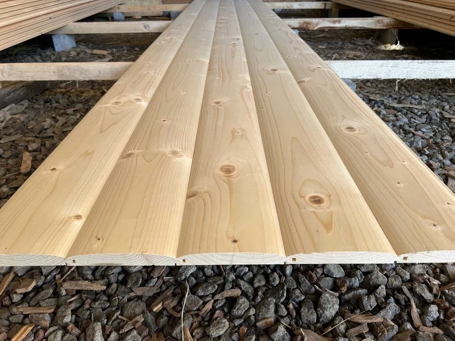 Loglap cladding profile showing rounded face and overlapping timber boards